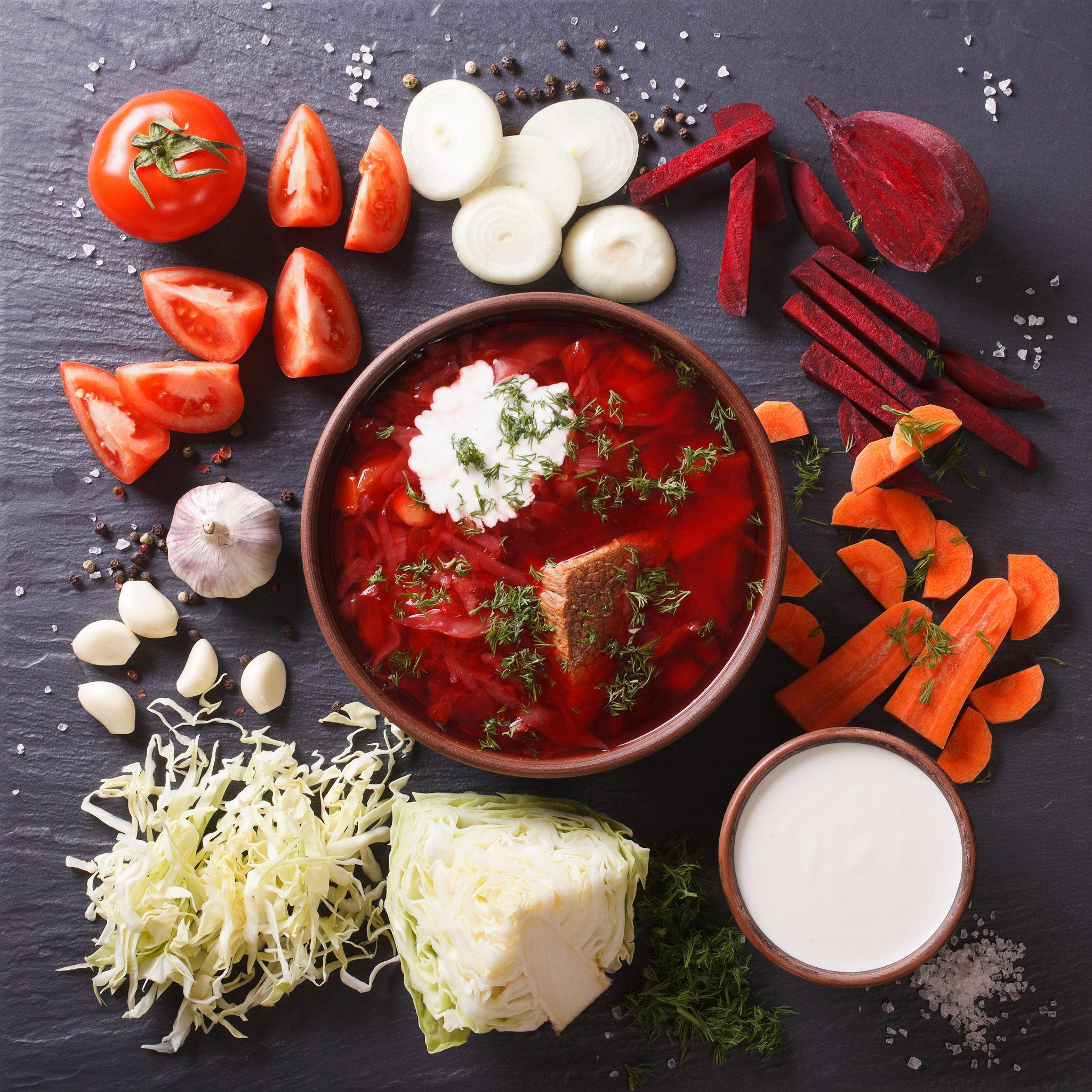 Fresh borscht ingredients — beets, cabbage, tomatoes, carrots