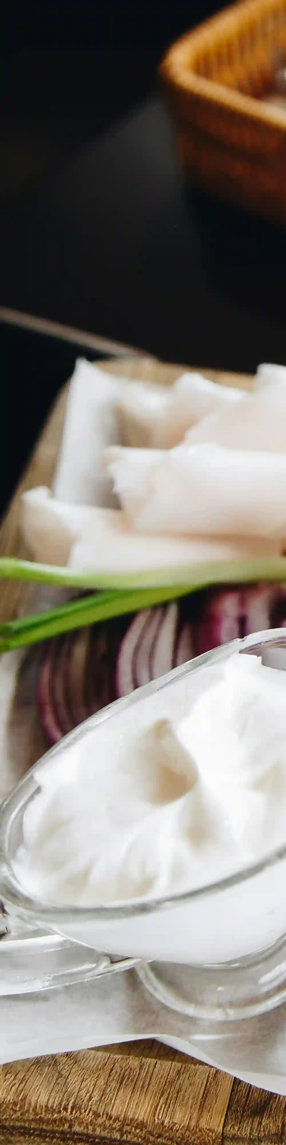 Thick sour cream served alongside borscht